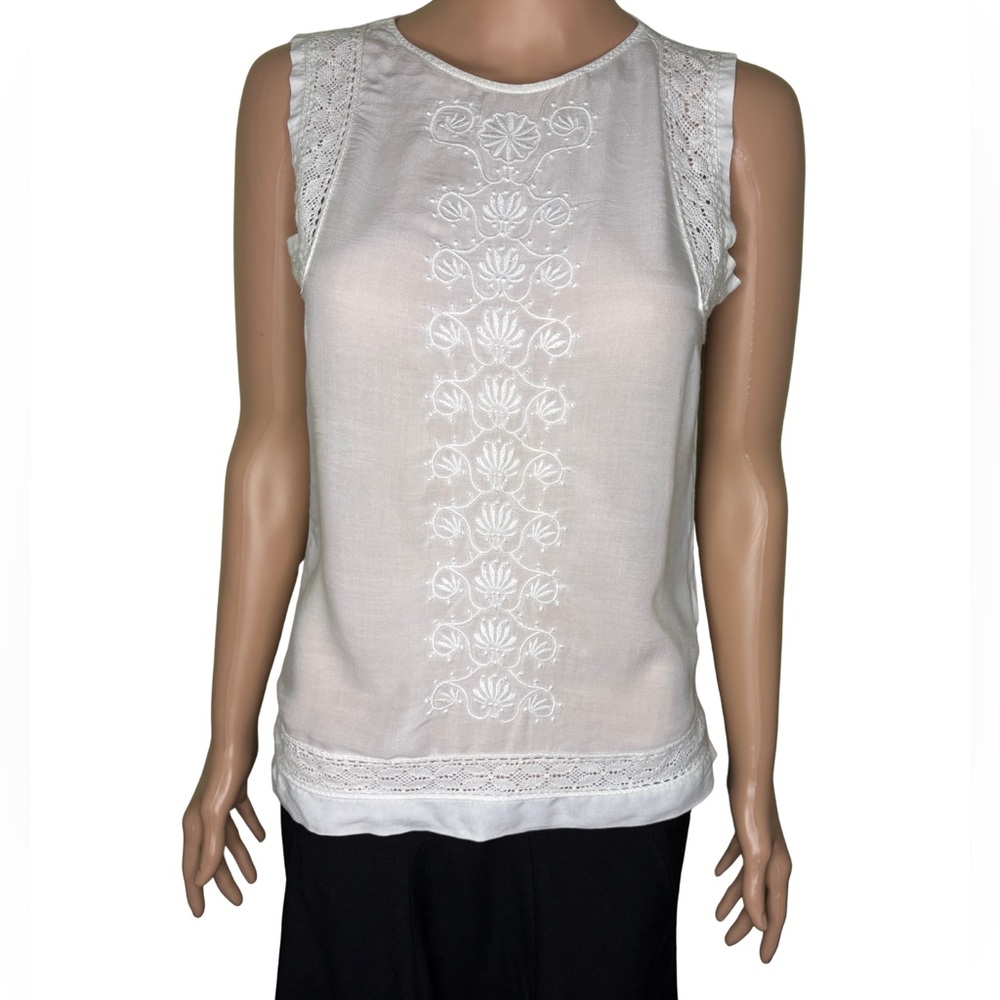 Dainty White Sleeveless Blouse
